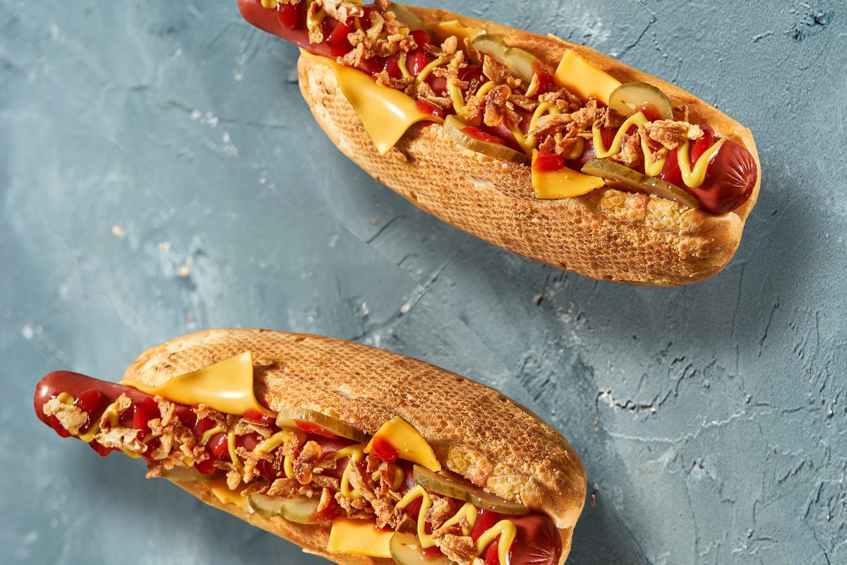 A City Divided – Where Do You Put The Onion On Your Sausage Sanga: Above Or Below The Meat? image